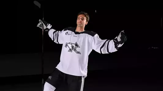 Jack Laferriere Men's Hockey celebrating