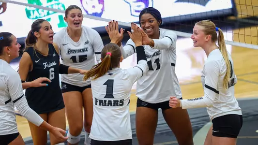 Lyric Berry and Miller McDonald High Five celebration against Manhattan