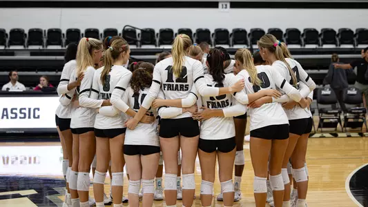 Team Huddle Against Manhattan in the Friar Classic