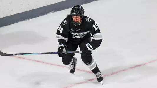 Women's ice hockey player Grace Van Volsen skating during a game against Sacred Heart