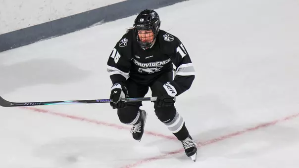 Women's ice hockey player Grace Van Volsen skating during a game against Sacred Heart