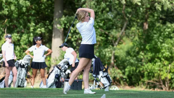 Women's golf player Annabel Widdifield hitting a tee shot