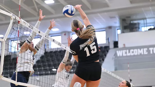 Macy Taylor with a kill against Xavier