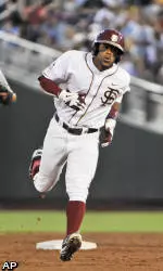 Johnson, Travis Honored On CWS Team