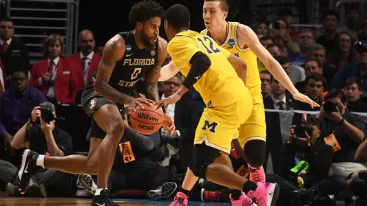 Magic Run Ends With Loss To Michigan In Elite 8