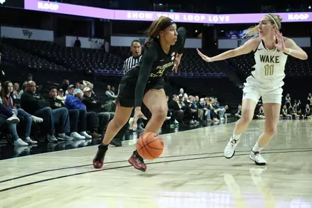 Baldwin, Weber Deliver Down Stretch In 70-65 Win