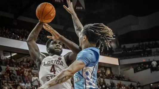 Williams Surges, Defense Stifles In 65-59 Win Over UNC