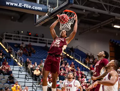 Basketball Tops LMU, 73-45; Will Play Missouri Monday