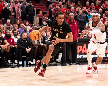 M. Basketball Defeats Louisville, 81-78