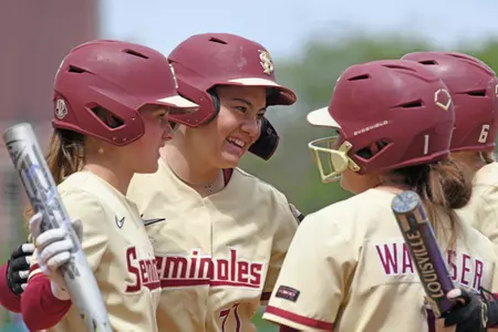 No. 5 Softball Races Past Hatters in 7-2 Win