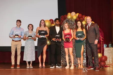 2023 Golden Nole Award Show:
ACC TOP 6 FOR SERVICE - (L-R): Lucas Bouquot, Track & Field; Dani Thompson, Cross Country; Arianni Ottavianelli, Swimming & Diving; C.J. Campbell, Jr., Football; Madison Slater, Cross Country, Victoria Cervantes, Swimming & diving, & Athletic Director Michael Alford.