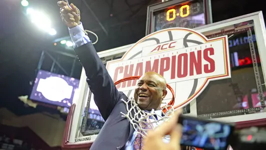 Leonard Hamilton cuts down the nets at ACC