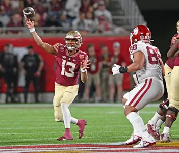 Jordan Travis throwing the ball in the Cheez-It Bowl vs. Oklahoma