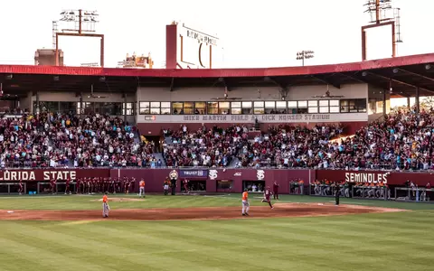 James Tibbs rounds third after a two-run home run
