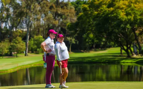 Bond, Ting Earn AC COach and Golfer of the Year Awards