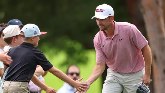 Jack Whaley gets some low-fives from fans at the fifth ole during the quarterfinals of the 2026 U.S. Amateur at Merion Golf Club in Ardmore, Pa. on Friday, Aug. 14, 2026. (Dustin Satloff/USGA)