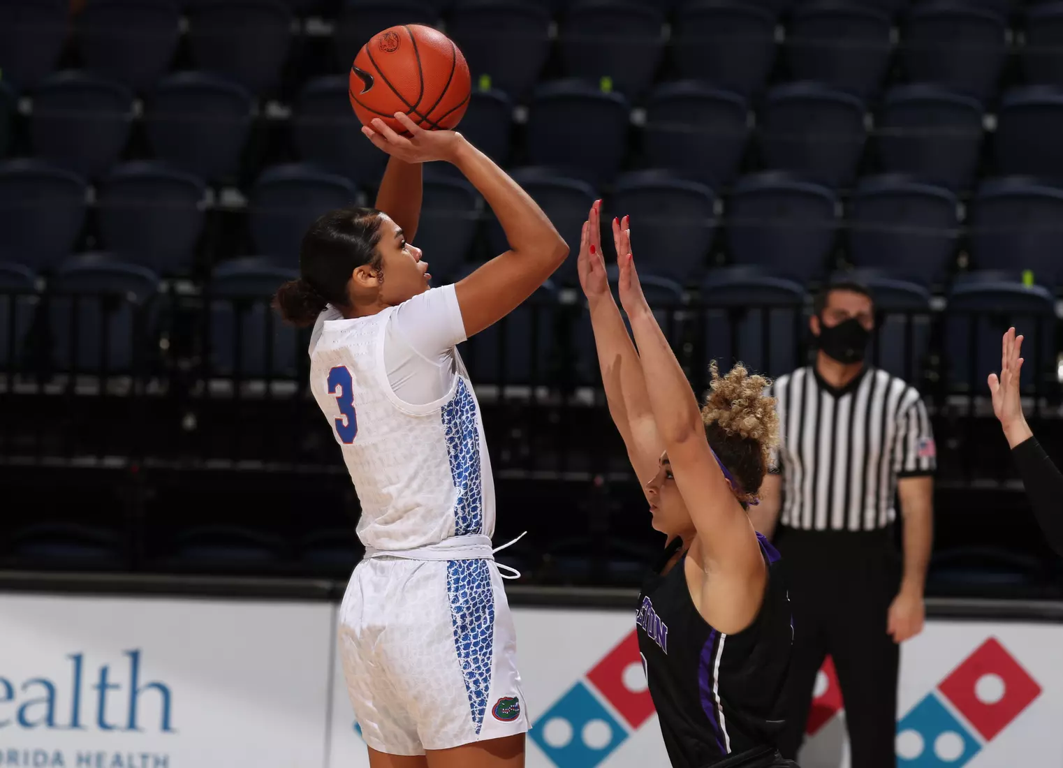 Scenes from the Gators' 84-52 win against the Texans