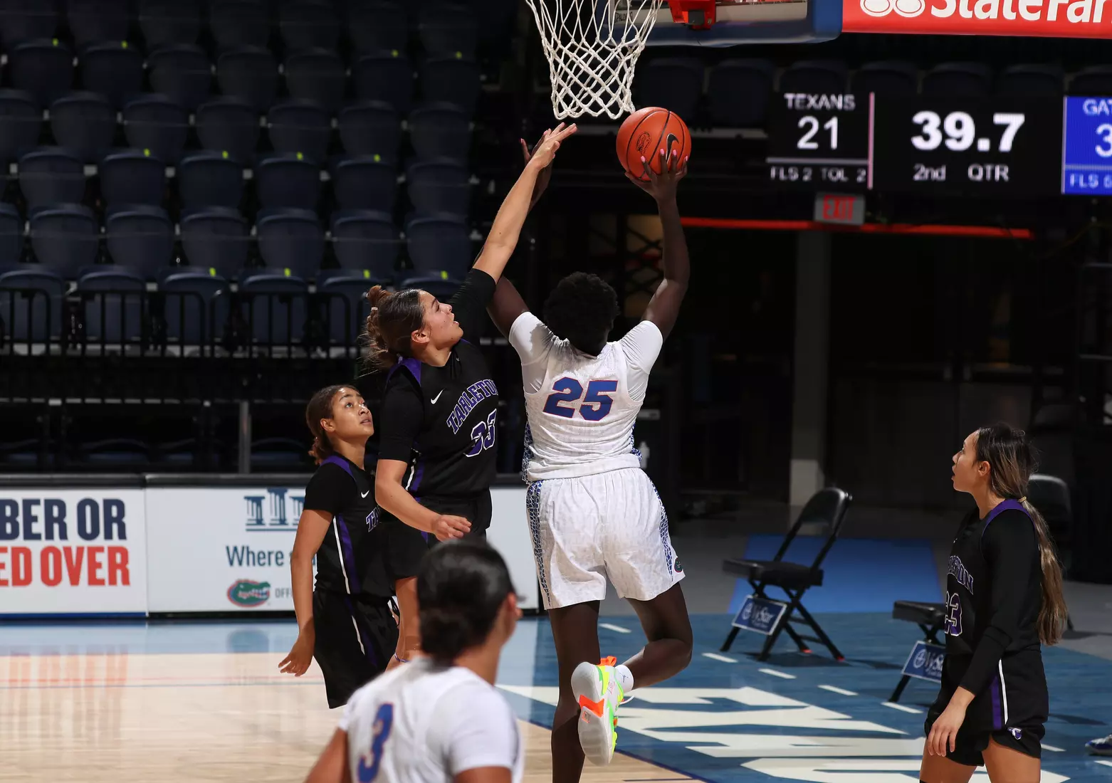 Scenes from the Gators' 84-52 win against the Texans