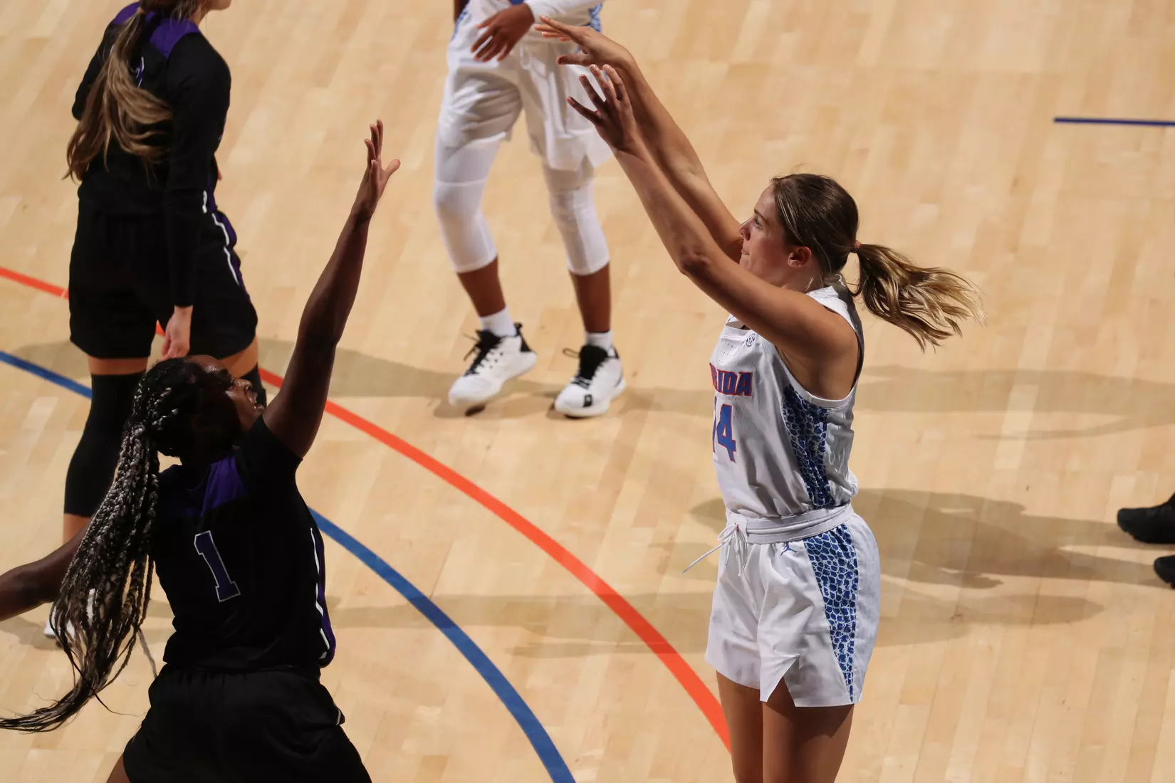 Scenes from the Gators' 84-52 win against the Texans