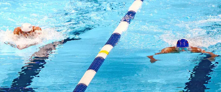 Phelps Holds Off Busy Lochte in Third Meeting of Trials