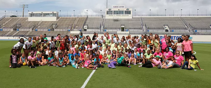 Rivalry put aside as Gators & Panthers join together for soccer clinic for area youth