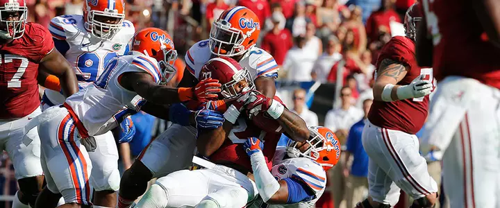 Gators Seek to be More Than Just a Speed Bump in Heisman Hopeful Henry's Way
