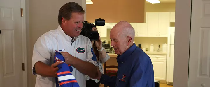 Surprise! -- McElwain Thanks Longtime Gators Season-Ticket Holder with Unexpected Visit