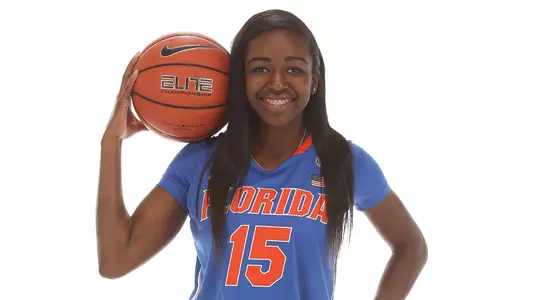 Sydney Searcy posed ball near hear