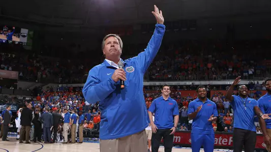 Jim McElwain speaks at basketball game