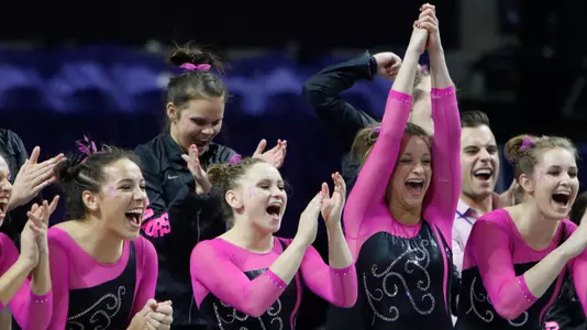 Amelia Hundley, Rachel Gowey, Amanda Cheney and Claire Boyce celebrate a routine - 1-27-17 vs Auburn