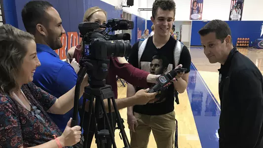 Coach Cameron Newbauer, media