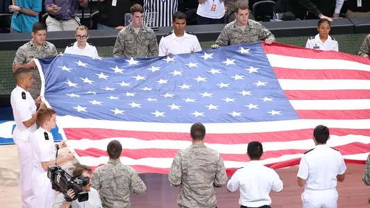 ROTC holding USA Flag
