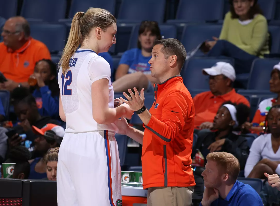 Cameron Newbauer, Paulina Hersler sideline talk
