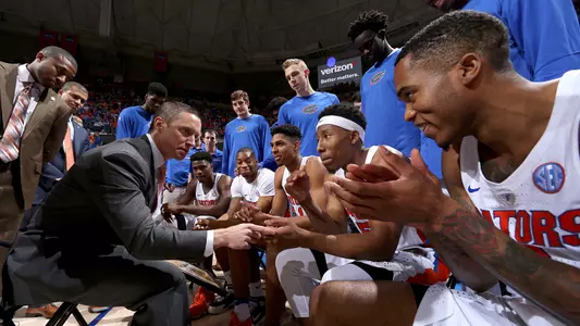 Mike White, Kasey Hill, huddle
