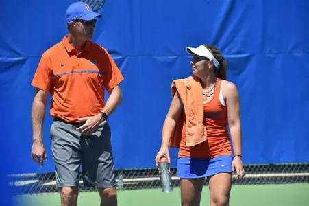 Brooke Austin, Roland Thornqvist walking off court
