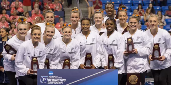 Gators with third-place trophies at 2017 NCAA Super Six team final