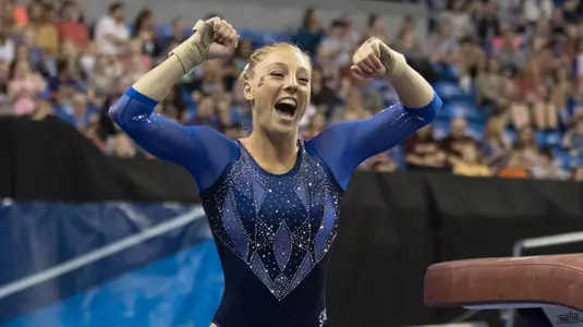 Alex McMurtry celebrates her vault at 2017 NCAA Semifinal II