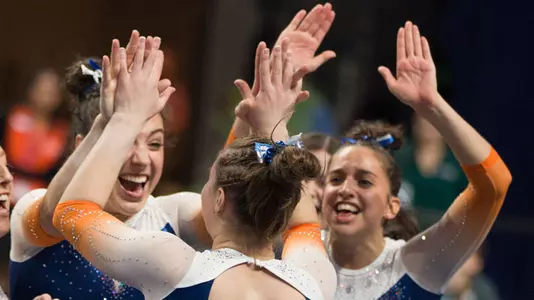 Amelia Hundley and Rachel Slocum celebrate Megan Skaggs floor routine - 1-12-18
