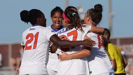 The Gators celebrate Madison Alexander's penalty kick goal versus Auburn in SEC Tournament Opening Round