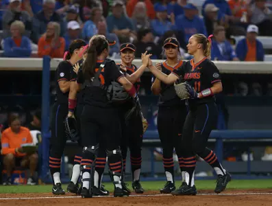 The Gators huddle during their 9-0 win against the UNF Ospreys on Wednesday, February 14, 2018 at Katie Seashole Pressly Softball Stadium in Gainesville, Fla. / UAA Communications photo by Piper Hansen