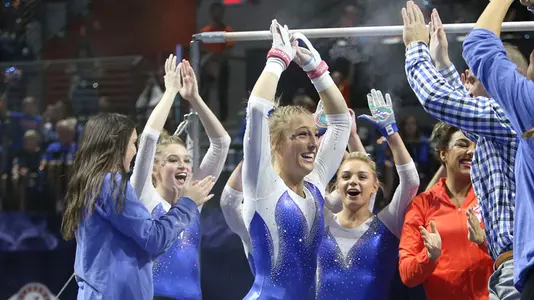 Alex McMurtry - uneven bars celebrate versus Alabama