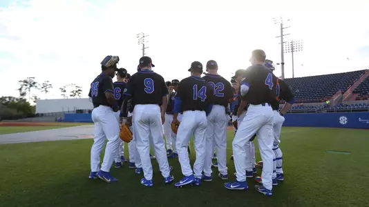 The Gators huddle during the Gators' game against the FAU Owls on Tuesday, February 20, 2018 at McKethan Stadium in Gainesville, Fla. / UAA Communications photo by Alex de la Osa