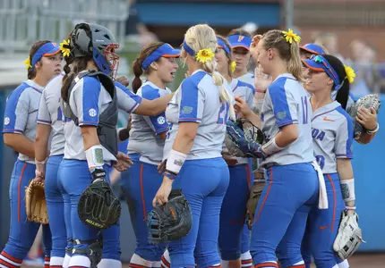 The team huddles during the Gators' 8-0 win against the Iowa State Cyclones on Saturday, February 24, 2018 at Katie Seashole Pressly Softball Stadium in Gainesville, FL / UAA Communications photo by Tim Casey