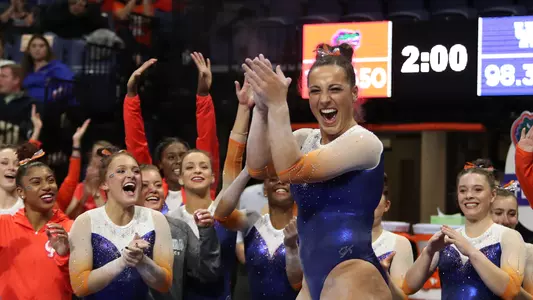 Amelia Hundley celebrates beam routine - vs Kentucky 1-25-19