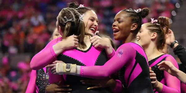 Savannah Schoenherr celebrates her uneven bars routine with Gators - 2-8-19