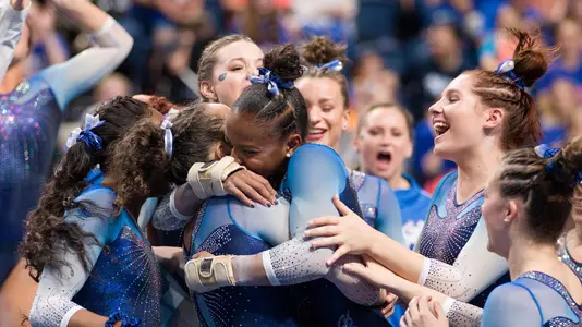 Trinity Thomas celebrates her floor routines with Gator teammates - 2-22-19