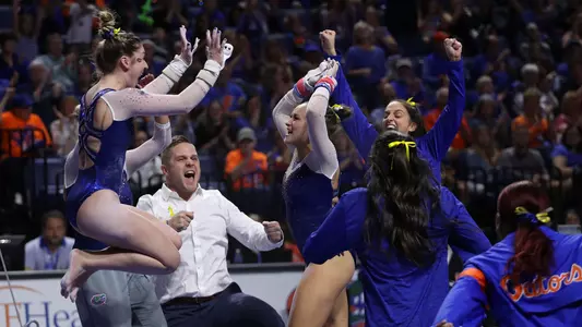Payton Richards celebrates her uneven bars routine versus Arkansas 200110