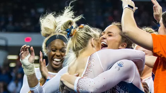 Savannah Schoenherr hugs Sydney Johnson-Scharpf - 200131