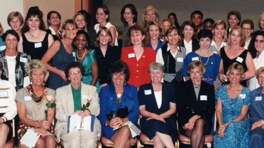Dr. Ruth Alexander (front row center in blue) at Florida's 25th Anniversary of Women's Athletics Banquet