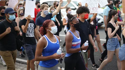 Nya Reed and Trinity Thomas participate in 200828 march